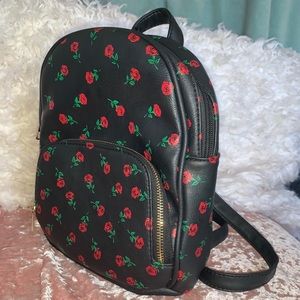 Black backpack purse with roses